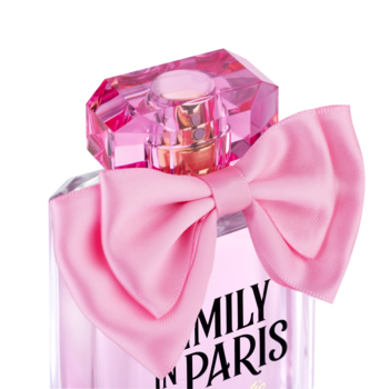 Emily in Paris Romantic woda perfumowana. Różowa butelka z dużą, satynową kokardą, zbliżenie.