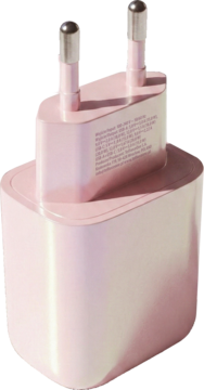 Różowa, owalna ładowarka sieciowa USB-C z dwoma metalowymi bolcami, widok ukośny z góry i boku.