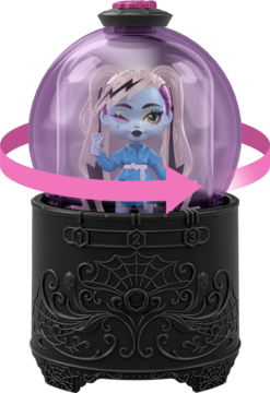 Monster High Mini Frankie Stein w fioletowej, otwieranej kapsule. Czarna podstawa z pajęczyną. Kolekcjonerska lalka niespodzianka.