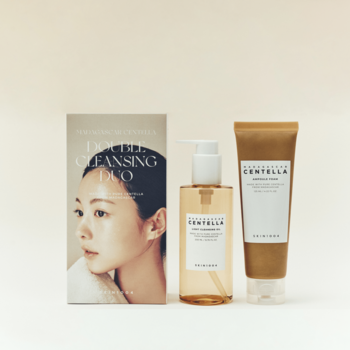 Zestaw SKIN1004 Centella Double Cleansing Duo: olejek z pompką i pianka w tubce, obok opakowania z kobietą.