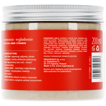 Tył cukrowego peelingu do ciała Organique Spicy Therapy 200ml. Czerwona etykieta ze składnikami i opisem.