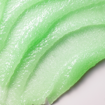 Peeling do mycia ciała Fluff Matcha Latte, jasnozielony, kremowy, z wyraźnymi falami tekstury.