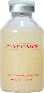 every routine Lift-seal Gold Ampoule w szklanej butelce z żółtym płynem i złotymi nićmi, widok z przodu.