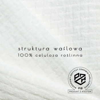 Zbliżenie na białe, waflowe ręczniki TOWL z napisem '100% celuloza roślinna' i certyfikatem PZH.