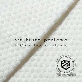 Zbliżenie na biały ręcznik TOWL z perłową strukturą, napisem 100% celuloza roślinna i logo PZH.
