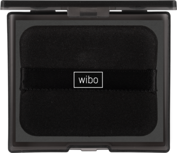 Widok z góry na otwarte, ciemne etui Wibo z bibułkami matującymi i czarnym puszkiem z logo.