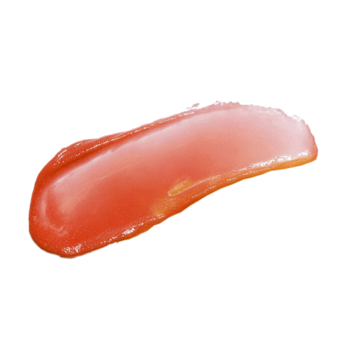 Artdeco Gel.ly Blush Stick Orange – żelowy róż do policzków w błyszczącej, koralowej mazi na białym tle.