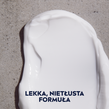 Biała, kremowa formuła NIVEA MEN Creme, rozsmarowana na szarej teksturze. Napis: LEKKA, NIETŁUSTA FORMUŁA.