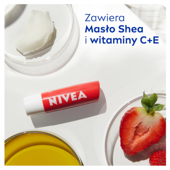 NIVEA Strawberry pomadka koloryzująca, czerwona tubka, na białym tle z truskawkami i Masłem Shea.