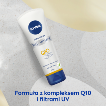Biała tubka kremu do rąk NIVEA Q10 Anti-Age 3w1, z niebieską nakrętką, widok pod kątem.