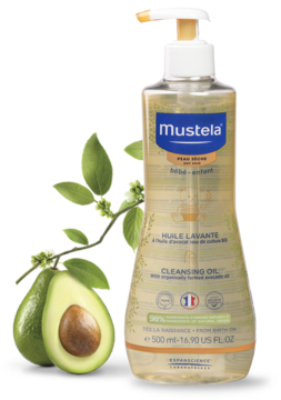 Mustela olejek myjący z awokado dla suchej skóry, 500ml butelka z pompką, na tle gałązki z awokado.