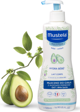 Nawilżające mleczko Mustela Hydra Bébé z awokado w białej butelce 500ml, widok z owocem.