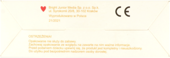 Tył opakowania puzzli dinozaury z jasnego kartonu. Widoczny adres producenta, znak CE i polskie ostrzeżenia.