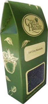 Zielone pudełko herbaty Czas na Herbatę Earl Grey Bluebottle, z widocznymi liśćmi przez okno, ujęcie pod kątem.