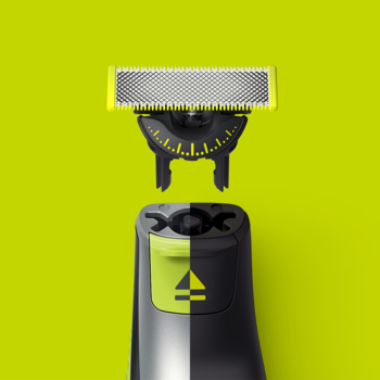 Philips OneBlade: Ostrze 360 stopni uniesione nad rączką, pokazujące gotowość do montażu, na zielonym tle.