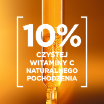 Zbliżenie: złote serum Garnier w pipecie, z napisem "10% CZYSTEJ WITAMINY C NATURALNEGO POCHODZENIA" na tle.