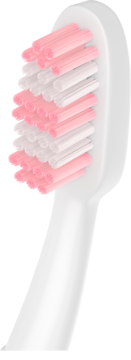 Zbliżenie białej główki szczoteczki Colgate Travel z różowo-białymi włóknami o różnej długości.