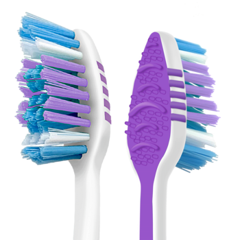 Close-up of two Colgate ZigZag MEDIUM toothbrush heads with blue, purple, and white angled bristles and purple tongue cleaner.