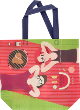 Ekologiczna torba z letnim motywem, widok złożonego ciemnego materiału i kolorowej ilustracji pikniku.