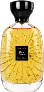 Atelier des Ors Bois Sikar woda perfumowana, butelka ze złotym płynem, płatkami, promienistym wzorem, czarna nakrętka, front.