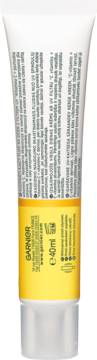 Lekki fluid Garnier z witaminą C i SPF50+ w biało-żółtej tubce, widok z tyłu z opisem produktu.