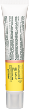 Garnier Vitamin C SPF50+ fluid w białej tubie z żółto-różową etykietą, widok z tyłu, z obróconym tekstem.