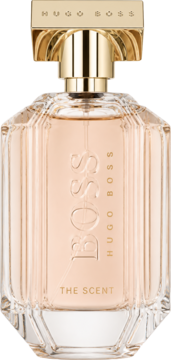 Damska woda perfumowana Hugo Boss The Scent, przezroczysty flakon z brzoskwiniowym płynem, napisem BOSS i złotą nakrętką.