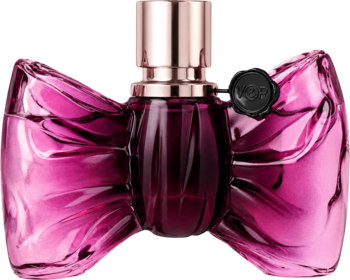 Viktor & Rolf Bonbon: purpurowa butelka w kształcie cukierka, otoczona lśniącą, fuksjową kokardą, widok z przodu.