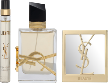 Zestaw YSL Libre EDP: duża butelka perfum, mały atomizer i złoty kompakt YSL Beautè, widok z przodu.