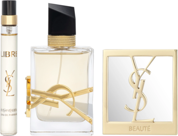 Zestaw YSL Libre: woda perfumowana, travel spray i złote lusterko z logo na czarnym tle. Widok frontalny.