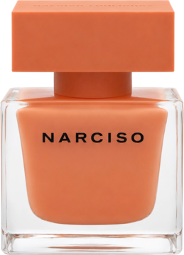 Narciso Eau de Parfum Ambrée w pomarańczowym flakonie z czarnym NARCISO, przezroczystą podstawą, widok z przodu.