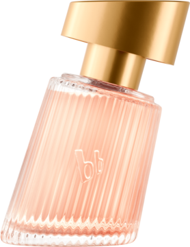 Bruno Banani Radiant Woman EDP w pochylonym, ryflowanym flakonie ze złotą zakrętką, widok z boku.