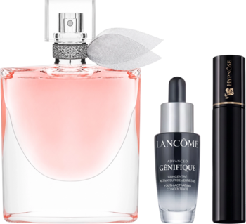 Zestaw Lancôme: perfumy La Vie Est Belle z różowym płynem, serum Genifique i tusz Hypnôse na białym.