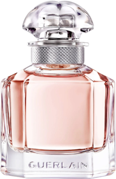 Szklany flakon perfum Guerlain Mon Guerlain z różowym płynem, fasetowanym korkiem, widok z przodu.