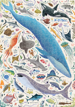 CzuCzu Puzzle Ryby i Zwierzęta Wodne: ilustracja złożonych puzzli z błękitnym wielorybem i mnóstwem morskich zwierząt.