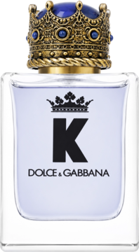 Perfumy K by Dolce & Gabbana, butelka z czystego szkła, z napisem K i złotą koroną z niebieskimi detalami.