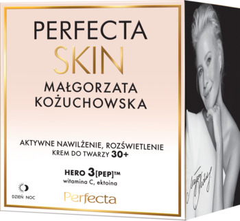 Krem Perfecta Skin 30+ rozświetlający z witaminą C w jasnoróżowym pudełku, z wizerunkiem Małgorzaty Kożuchowskiej.