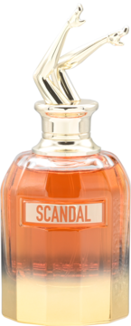 Perfumy Scandal, szklana butelka z pomarańczowym płynem, złota nakrętka w kształcie skrzyżowanych nóg, przód.
