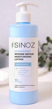 Nawilżający balsam SINOZ Hydrparo Intense Repair z pantenolem, niebieska butelka z białym dozownikiem, widok z przodu.