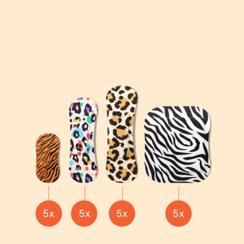 Zestaw plastrów Wild Stripes: cztery zwierzęce wzory – tygrys, lamparcie i zebra – na jasnym tle.