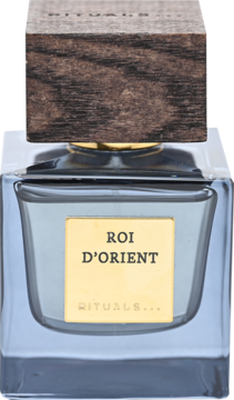 Rituals Roi D'Orient woda perfumowana w szarej butelce ze złotą etykietą i drewnianą nakrętką, widok z przodu.