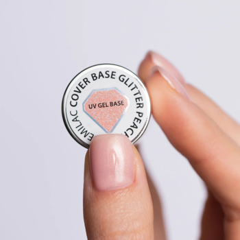 Semilac Skin Tone Cover Base, brzoskwiniowa baza hybrydowa z brokatem, trzymana w palcach, mała metalowa puszka.