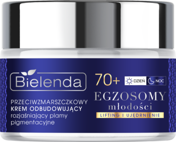 Bielenda 70+ krem przeciwzmarszczkowy z egzosomami, biały słoik z granatową etykietą, rozjaśnia przebarwienia.