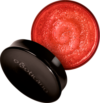 Nativa SPA Plum Flower cukrowy peeling do ciała. Otwarty czarny słoiczek O Boticario, wnętrze z czerwoną, ziarnistą masą.