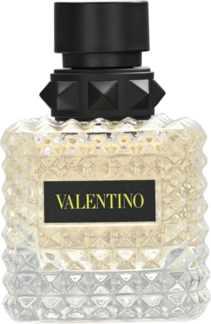 Valentino Donna Born In Roma Yellow Dream, damska woda perfumowana, butelka z żółtym płynem, fasetowana z czarną ćwiekowaną zakrętką.
