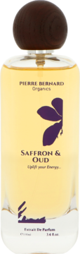 Pierre Bernard Organics Saffron & Oud Extrait De Parfum w szklanej butelce z żółtym płynem, drewnianym korkiem, widok z przodu.