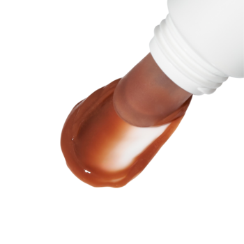 Peptydowy balsam do ust Your Kaya Cocoa Nude, czekoladowa smuga wylewająca się z białej tubki.