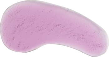 Zbliżenie na różowy olejek do ust Tuli Labs Currant Bliss, półprzezroczysta, błyszcząca smuga produktu.
