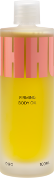 Hhuumm Ujędrniający Olejek do Ciała 100ml w butelce, różowa etykieta z napisem FIRMING BODY OIL, żółty płyn.