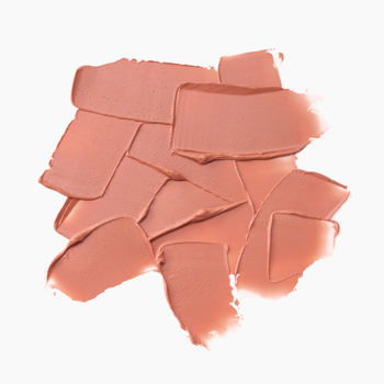 Zbliżenie kremowych smug balsamu do ust Catrice Care In Colours Happy Hour. Ciepły odcień nude na białym tle.